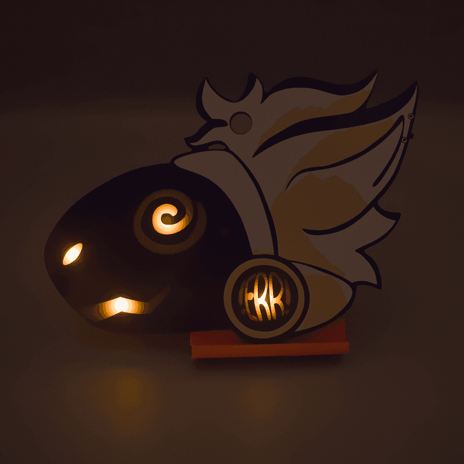 Dark photo of a PCB badge in the shape of a furry protogen's head. They have brightly illuminated yellow facial features, white hair, ontop a blue base. Their eye is swirly, and the symbol on their cheek reads "!ERR!".